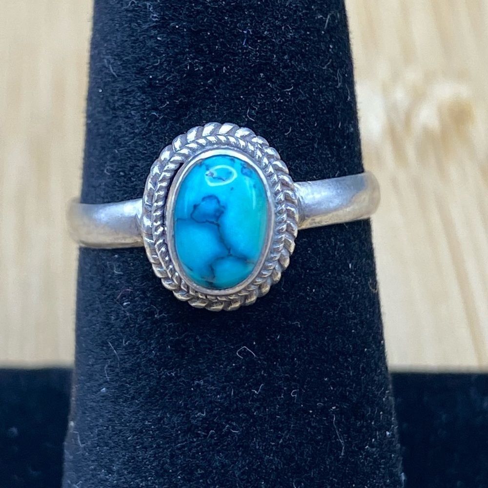 925 silver adjustable band oval turquoise 5 x 7 mm I’m current size of 6 3/4